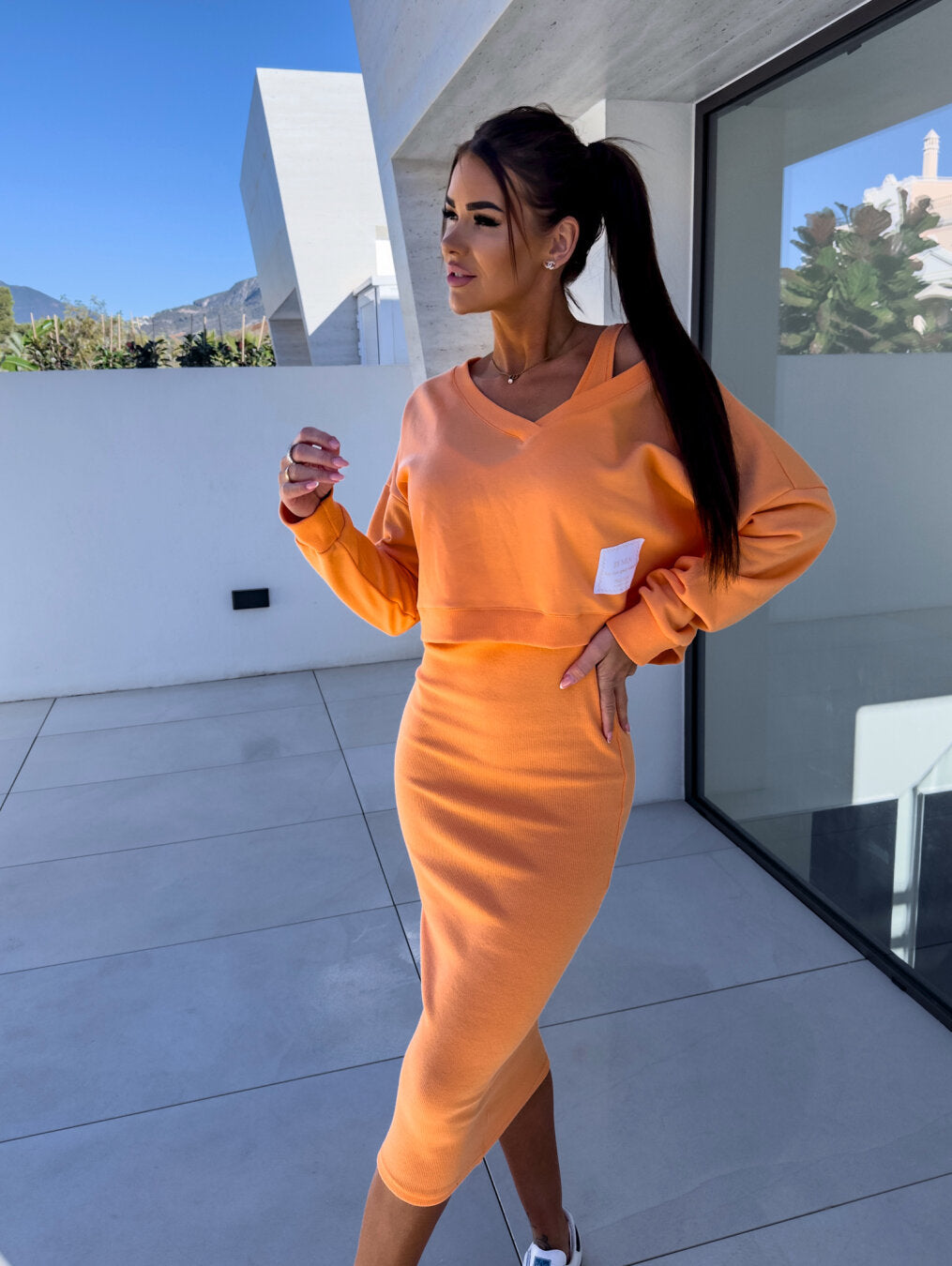Brandname Two-Piece Knitted Midi Skirt Set with V-Neck Top in Various Colors — Main Image